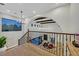 Grand foyer with vaulted ceilings, decorative beams, elegant chandelier, and wood flooring at 11906 Port Labelle Dr, Las Vegas, NV 89141
