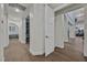 Bright hallway leading to rooms with hardwood floors and modern finishes at 11906 Port Labelle Dr, Las Vegas, NV 89141