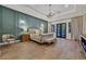 Spacious main bedroom with a decorative wall and sleek floors leads to an outdoor living area at 11906 Port Labelle Dr, Las Vegas, NV 89141