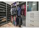 Spacious walk-in closet with custom shelving and ample storage for clothing at 11906 Port Labelle Dr, Las Vegas, NV 89141
