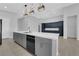 Bright kitchen features a large island with stainless steel appliances at 11909 Pippa Ave, Las Vegas, NV 89138