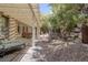Secluded backyard with a covered patio, landscaping, and plenty of space to relax at 1329 Calle Cantar, Henderson, NV 89012