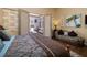 Comfortable bedroom featuring a door opening up to a patio at 1329 Calle Cantar, Henderson, NV 89012