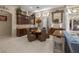 Cozy dining area featuring custom cabinetry, a round table, and seating for six at 1329 Calle Cantar, Henderson, NV 89012