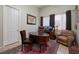 Cozy home office featuring an executive desk, comfortable seating, and ample natural light at 1329 Calle Cantar, Henderson, NV 89012