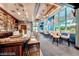 Elegant bar area featuring a marble countertop, comfortable seating, and well-stocked liquor cabinets at 135 E Harmon Ave # 1703, Las Vegas, NV 89109