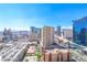 Expansive city view showcasing skyscrapers, a hotel, and a bright blue sky at 135 E Harmon Ave # 1703, Las Vegas, NV 89109