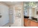 Entryway with bathroom view, featuring a mirrored bar area and a tiled floor at 135 E Harmon Ave # 1703, Las Vegas, NV 89109