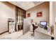 Functional office space featuring modern desks, printer, and neutral decor at 135 E Harmon Ave # 1703, Las Vegas, NV 89109