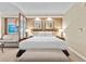 Comfortable bedroom featuring seating and a partial room divider at 135 E Harmon Ave # 407, Las Vegas, NV 89109