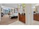 Bright bedroom featuring a luxurious bed, workspace and a convenient wet bar area at 135 E Harmon Ave # 407, Las Vegas, NV 89109
