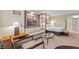 Comfortable living room space including a sofa, desk and bed for relaxing at 135 E Harmon Ave # 407, Las Vegas, NV 89109