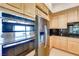 Modern kitchen showcasing stainless steel appliances, including an oven, microwave, and refrigerator at 1744 Williamsport St, Henderson, NV 89052
