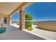 Covered back patio with desert views and outdoor kitchen area, perfect for entertaining guests at 1744 Williamsport St, Henderson, NV 89052