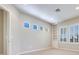 Bright bedroom featuring built-in shelves, neutral walls, and carpet flooring, offering a serene space at 1744 Williamsport St, Henderson, NV 89052
