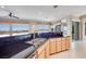 Open kitchen features a breakfast bar with granite counters and a stunning outdoor view at 1744 Williamsport St, Henderson, NV 89052