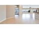 Spacious living room featuring beautiful floors, archways, and large windows with great views at 1744 Williamsport St, Henderson, NV 89052