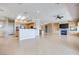 Bright open concept space showcasing the kitchen, dining, and living areas with ample natural light at 1744 Williamsport St, Henderson, NV 89052