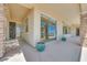 Spacious covered patio with large windows and sliding doors, perfect for enjoying outdoor living at 1744 Williamsport St, Henderson, NV 89052