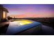 Relaxing backyard pool at sunset with stunning mountain views and city lights at 1744 Williamsport St, Henderson, NV 89052