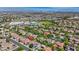 A wide angle aerial view of the house's location in a green neighborhood, near a park at 2262 Alanhurst Dr, Henderson, NV 89052