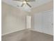 Comfortable bedroom featuring carpet, ceiling fan, closet space and neutral paint at 2262 Alanhurst Dr, Henderson, NV 89052