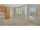 Cozy dining area featuring natural light, tile floors, and outside access at 2262 Alanhurst Dr, Henderson, NV 89052