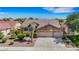 Charming single-story home featuring a three-car garage and well-maintained landscaping at 2262 Alanhurst Dr, Henderson, NV 89052