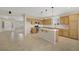 Spacious kitchen featuring an island, modern appliances, and tile flooring at 2262 Alanhurst Dr, Henderson, NV 89052