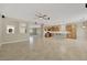 Large living space featuring tile floors and seamless kitchen access at 2262 Alanhurst Dr, Henderson, NV 89052