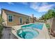 Inviting pool and spa with spacious patio, perfect for outdoor entertaining at 2262 Alanhurst Dr, Henderson, NV 89052