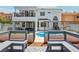 Backyard with a glimpse of a pool, a patio, and a sitting area, perfect for outdoor relaxation and entertainment at 2469 Sun Reef Rd, Las Vegas, NV 89128