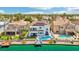 Beautiful backyard with a pool, lounge area, and waterfront access with a private dock at 2469 Sun Reef Rd, Las Vegas, NV 89128