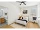 Cozy bedroom with a comfortable bed, modern decor, and en-suite bathroom at 2469 Sun Reef Rd, Las Vegas, NV 89128