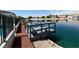 Charming dock overlooking the tranquil lake, perfect for peaceful waterfront enjoyment and relaxation at 2469 Sun Reef Rd, Las Vegas, NV 89128