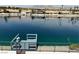 Scenic lake view featuring a private dock, enhancing the property's appeal and outdoor living at 2469 Sun Reef Rd, Las Vegas, NV 89128