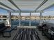 Stylish outdoor patio with lake view, ideal for entertaining and enjoying the scenery at 2469 Sun Reef Rd, Las Vegas, NV 89128