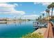 Picturesque waterfront view with a private dock and clear blue water, ideal for boating and recreation at 2469 Sun Reef Rd, Las Vegas, NV 89128