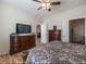 Main bedroom boasts wood floors and access to the ensuite bathroom at 2473 Luminous Stars St, Henderson, NV 89044