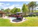 Backyard offers a dining area and pool, creating a luxurious outdoor living space at 259 Rockwell Springs Ct, Henderson, NV 89012