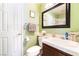 Charming bathroom featuring a single sink, dark vanity, and mirror at 259 Rockwell Springs Ct, Henderson, NV 89012