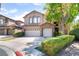 Charming two-story home with a stone facade and three car garage at 259 Rockwell Springs Ct, Henderson, NV 89012