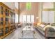 Open-concept living area featuring high ceilings, modern decor, and plenty of natural light at 259 Rockwell Springs Ct, Henderson, NV 89012