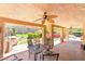 Spacious covered patio area with fan, offering the perfect spot to relax at 259 Rockwell Springs Ct, Henderson, NV 89012