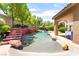 A beautifully designed pool with rock features offers a refreshing outdoor escape at 259 Rockwell Springs Ct, Henderson, NV 89012