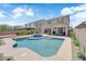 Spacious backyard with a luxurious pool and spa, perfect for outdoor entertaining and relaxation at 2714 Frabiele St, Henderson, NV 89044