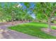 Beautifully landscaped community green space with walking paths and park benches at 2714 Frabiele St, Henderson, NV 89044