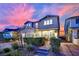 Beautiful two-story home with landscaped front yard, brick driveway, and a private walkway at 2714 Frabiele St, Henderson, NV 89044