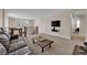 Spacious carpeted living room with comfortable furniture and large window offering natural light at 2714 Frabiele St, Henderson, NV 89044
