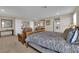 Spacious main bedroom featuring comfortable armchairs and a view to the bathroom and other rooms at 2714 Frabiele St, Henderson, NV 89044